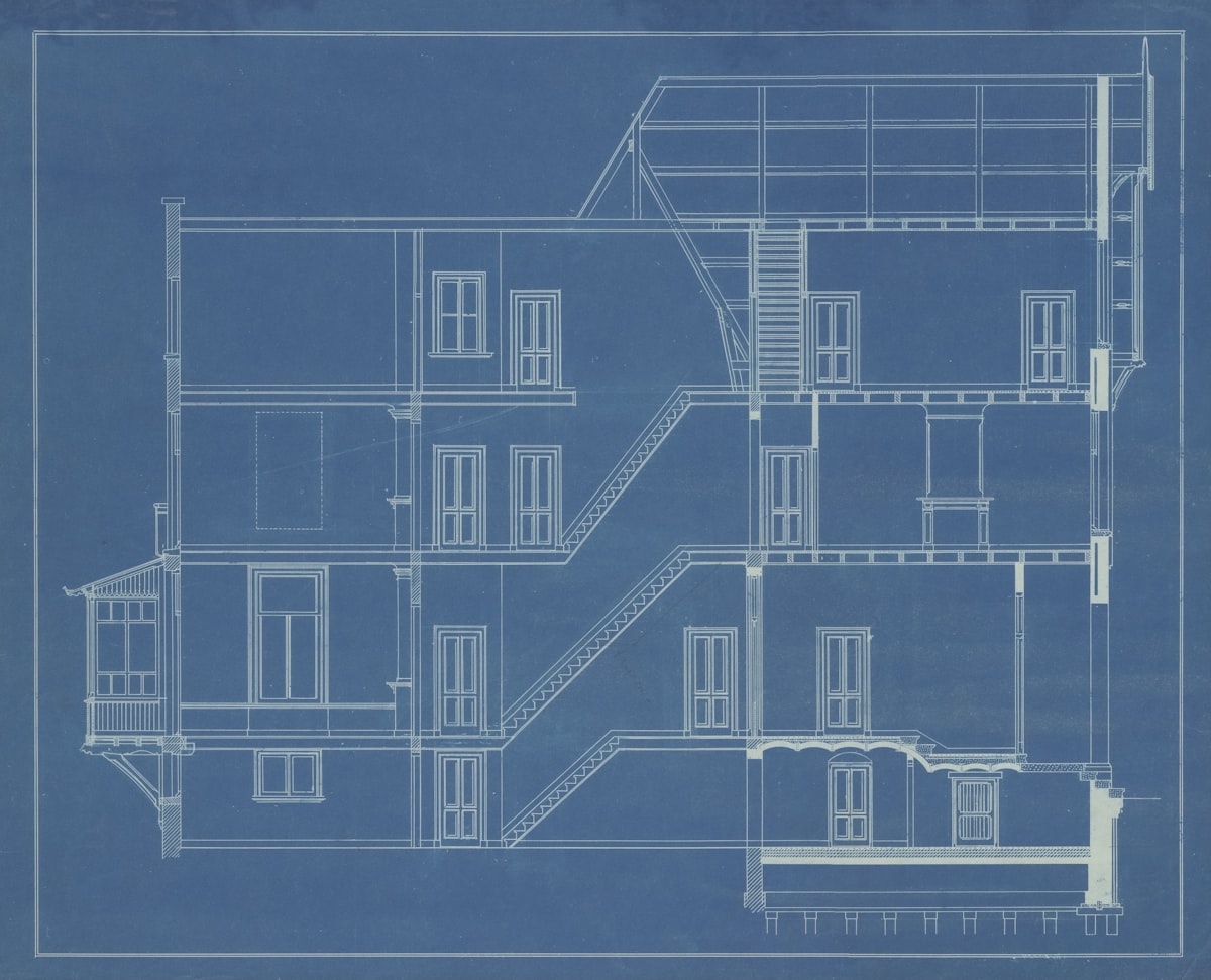 Architectural blueprint cross-section drawing on paper